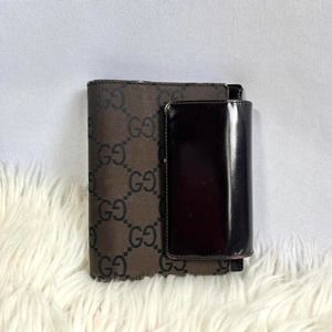 Black and Brown Gucci Monogram Wallet/ Agenda